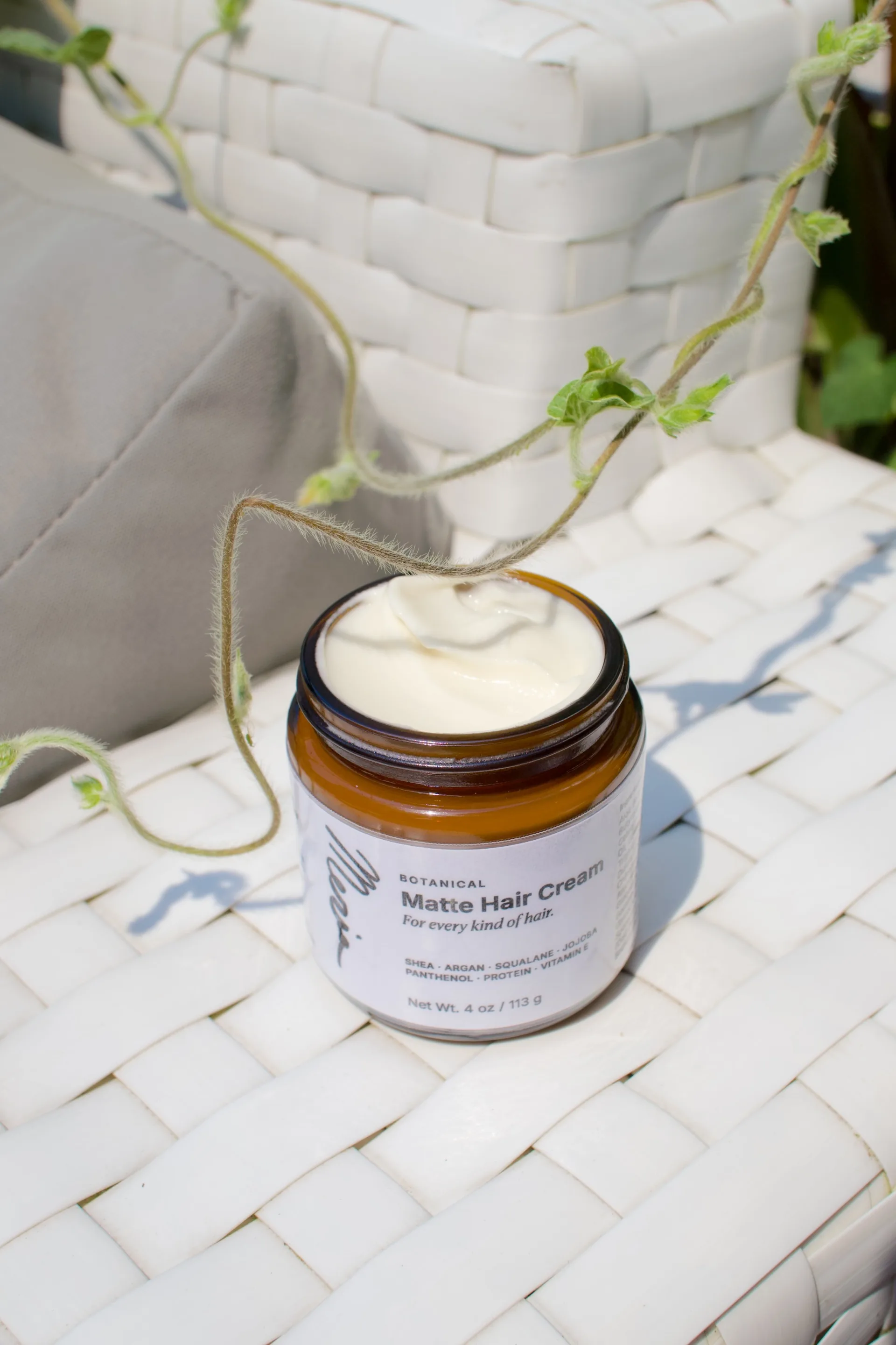 Meria Botanical Matte Hair Cream in a 4 oz amber glass jar